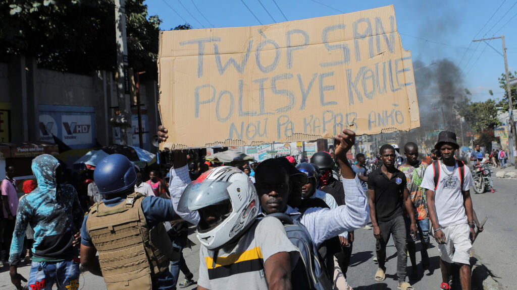 Haitian police favor blocking roads in retaliation for killings of officers