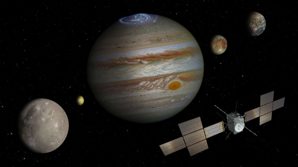 The JUICE mission will explore Jupiter and some of its moons, including Ganymede (foreground), Callisto (far right), and Europa (center).  (Credit: ESA)