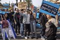 Protesters stage an escrache against the Israeli Supreme Court president to protest judicial reform