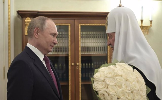 Russian President Vladimir Putin and Patriarch Kirill, leader of the Russian Orthodox Church.