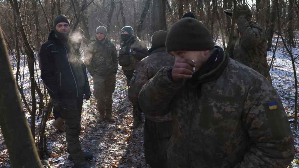 Ukrainian army, 43rd Heavy Artillery Brigade waits in the woods after firing a German Panzerhaubitze 2000 howitzer, as Russia's attack on Ukraine continues, near Soledar, Ukraine.