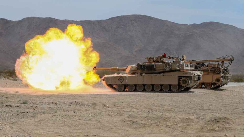 An M1A1 Abrams tank opening fire