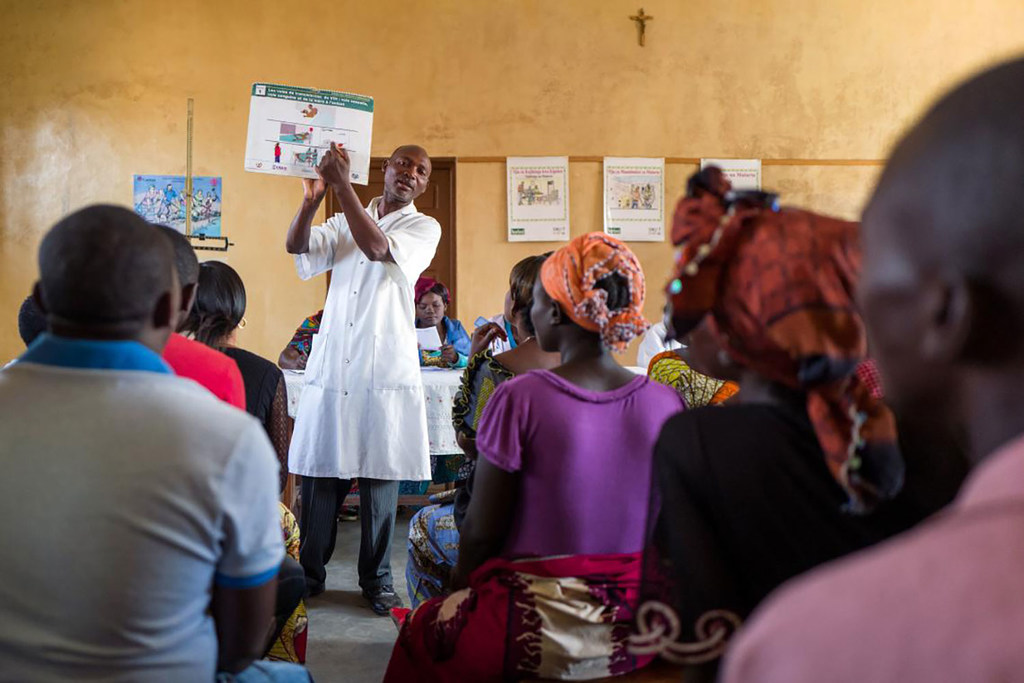 A nurse leads an awareness session on HIV transmission at a health center in the Democratic Republic of the Congo.