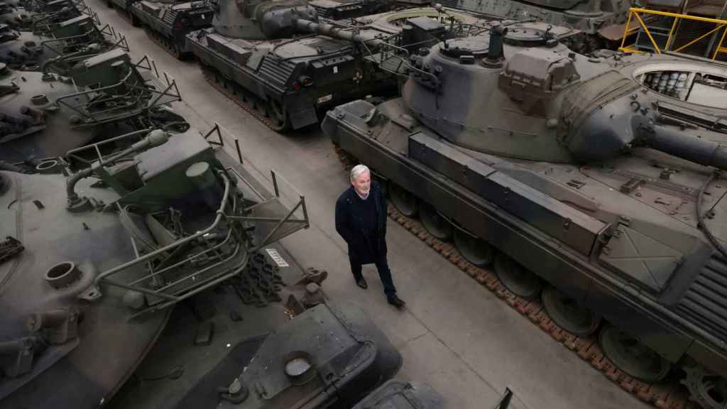 Freddy Versluys walks among the Leopard 1 tanks in his warehouse in eastern Belgium.