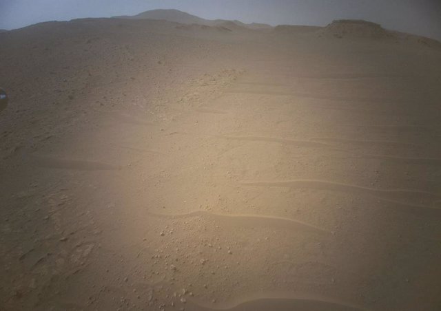 Image of the ground on Mars taken by the Ingneuity helicopter on its flight 43