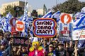 Protesters tie themselves to a minister's house in Israel in protest of Netanyahu's judicial reform