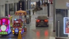 Two suspects drive a stolen car into the aisles of a shopping center in Canada