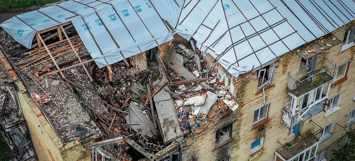 A residential building in Makariv, west of the Ukrainian capital kyiv, shows signs of damage from a bomb blast.