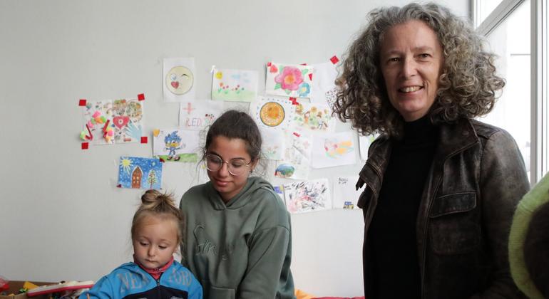 United Nations Resident and Humanitarian Coordinator Denise Brown meets with two residents of the southern Ukrainian city of Mykolayiv.