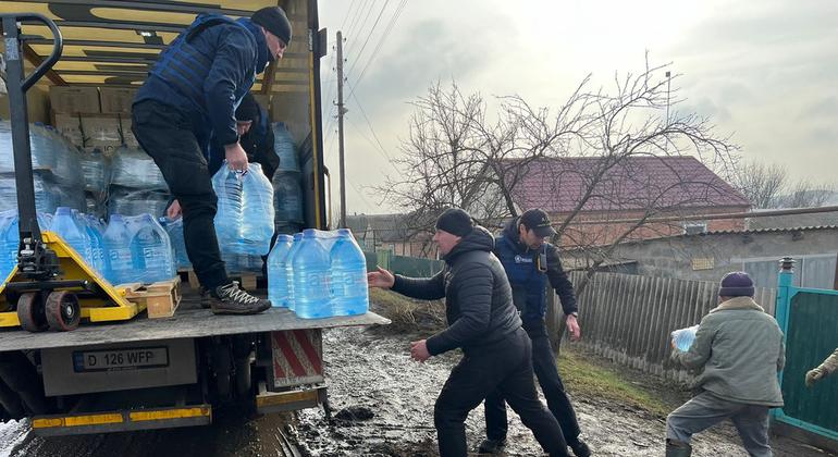 Aid workers distribute water and medical supplies in Donetsk, Ukraine.