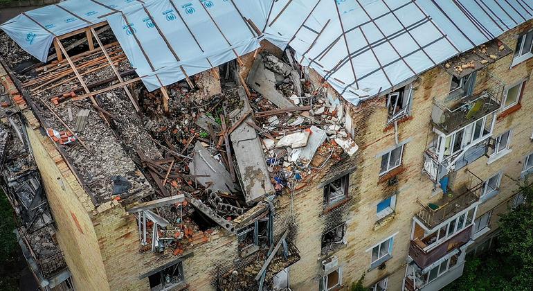 A residential building in Makariv, west of the Ukrainian capital kyiv, shows signs of damage from a bomb blast.