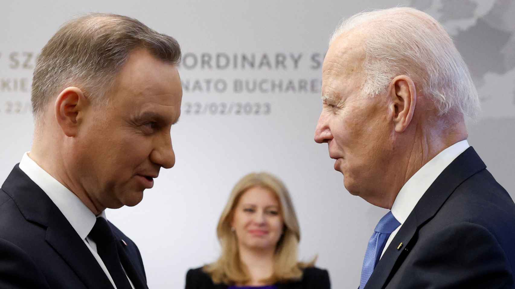 US President Joe Biden greets his Polish counterpart Andrzej Duda at the B9 summit in Warsaw