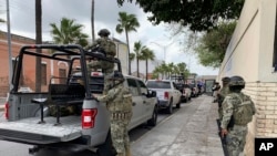 Mexican army soldiers prepare a search mission for four U.S. citizens kidnapped by gunmen in Matamoros, Mexico, Monday, March 6, 2023.