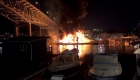 Fire in a marina destroys at least 30 boats