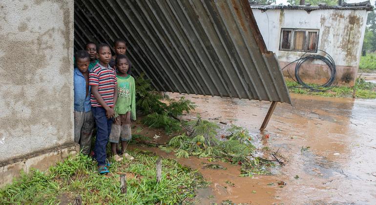 Children in the ruins of their school destroyed by Cyclone Freddy in Mozambique.