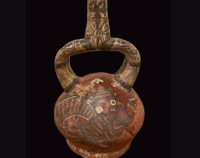 Ceramic vessel from the Moche region of northern Peru with Wari-influenced pigments and decoration techniques.