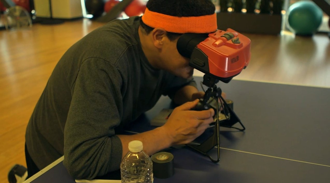 Reggie testing the Virtual Boy