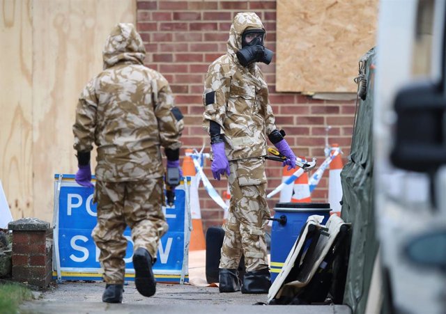 File - Military with protective suit in the area where the former Russian spy Sergei Skripal was poisoned with Novichok in Salisbury