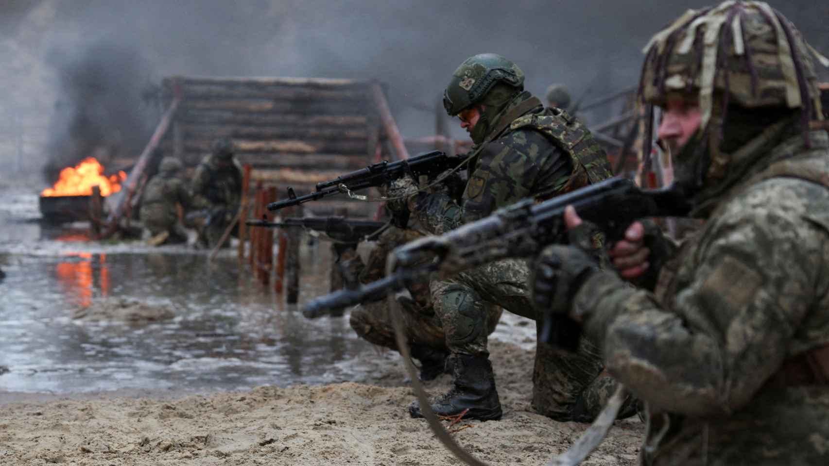 Ukrainian soldiers take part in a psychological combat training military drill.