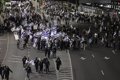 Thousands of pro-judicial reform supporters block the main access road to Tel Aviv