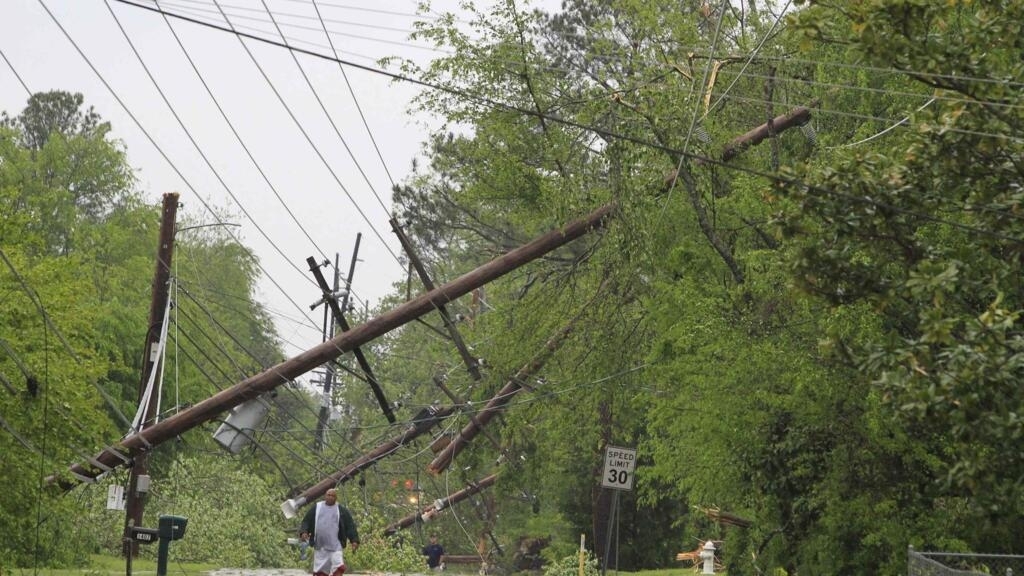 Violent storms leave at least 23 dead and dozens injured in Mississippi