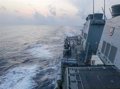 A US destroyer conducts a rights of navigation mission in the South China Sea