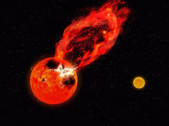 Artist's impression of the superflare observed on one of the stars in the V1355 Orionis binary star system.  The binary companion star is visible in the background on the right.