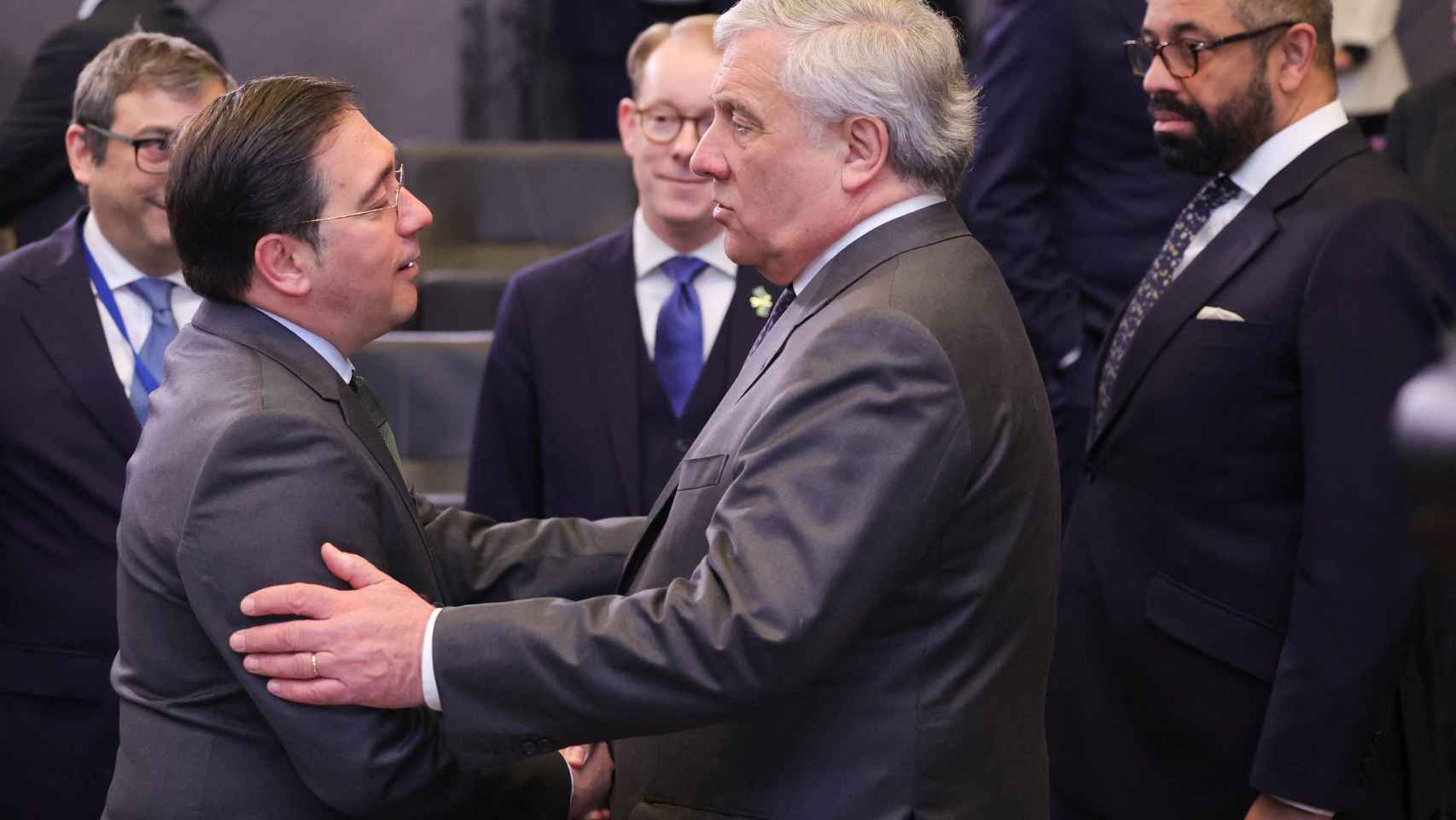 Foreign Minister, José Manuel Albares, greets his Italian counterpart, Antonio Tajani, during the NATO meeting in Brussels