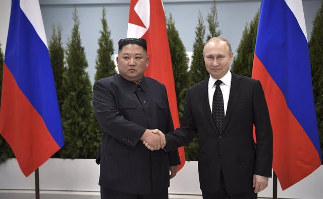 Archive - North Korean leader Kim Jong Un with Russian President Vladimir Putin