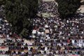 Tens of thousands of Muslims complete their midday prayers at Al Aqsa Mosque