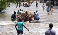 The death toll from the rains in Somalia rises to more than 20, leaving nearly 100,000 homeless