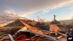 Damaged homes after a tornado ripped through Coralville, Iowa, on Friday, March 31, 2023. (AP Photo/Ryan Foley)