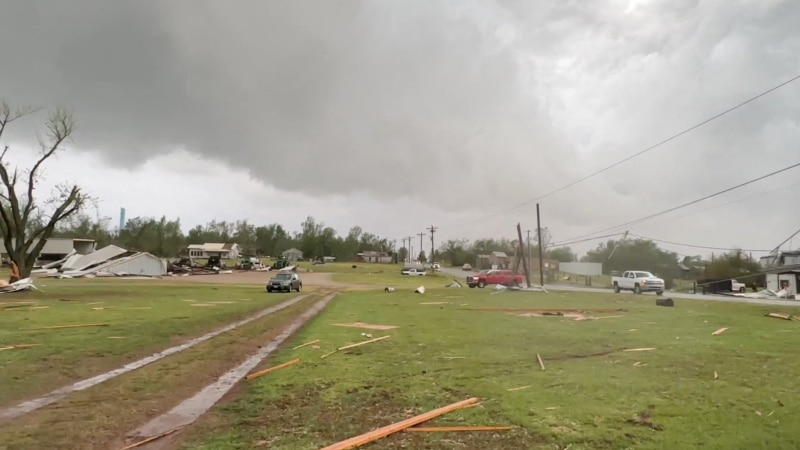 Two dead and destruction from tornadoes and storms in the central US