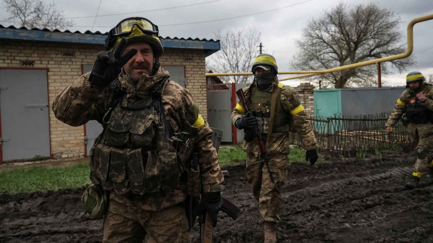 Ukrainian soldiers walk along a road in the Donetsk region this past Saturday.