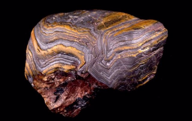 Metamorphosed banded iron formation of southern Wyoming showing deformation and folding.