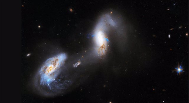 Interacting galaxies AM 1214-255.