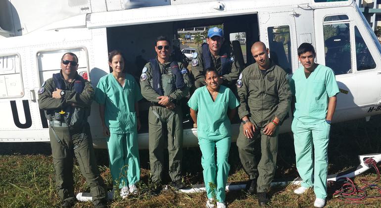 Commodore Chiappai together with UN peacekeepers and health personnel after having successfully transferred an injured person to the hospital in the Dominican Republic.  Credit: Commodore Javier Chiappai