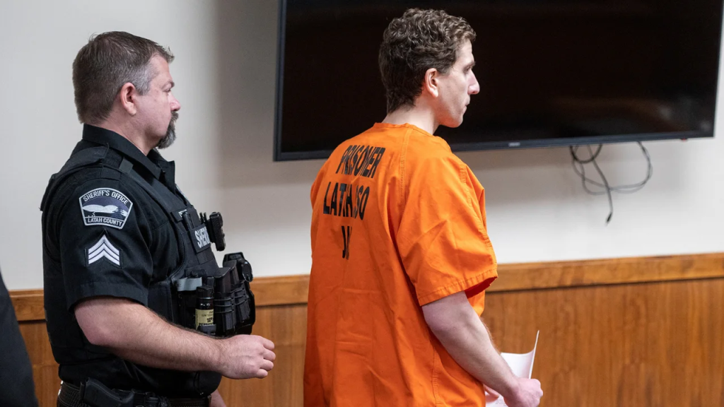 Bryan Kohberger is escorted out of the courtroom after his appearance.  (Photo: Zach Wilkinson/Reuters)