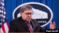 FILE - Attorney General William Barr speaks during a news conference on December 21, 2020, at the Justice Department in Washington.