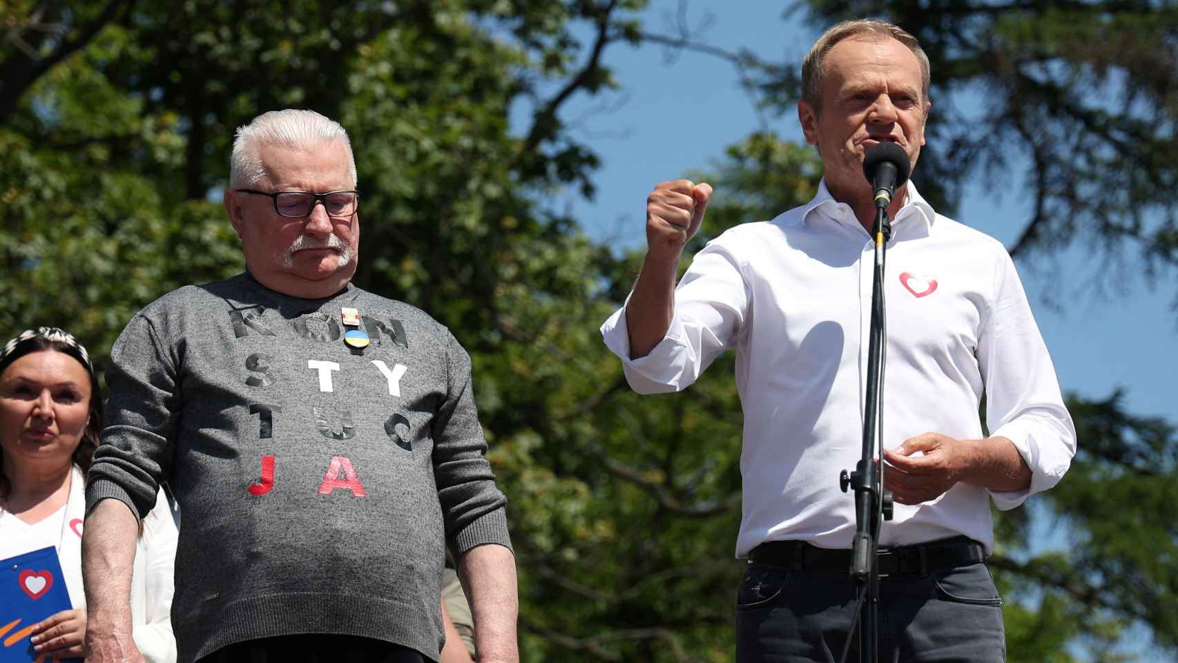 The leader of the main opposition Civic Platform (PO) party Donald Tusk and the former Polish president and Nobel Peace Prize winner Lech Walesa.