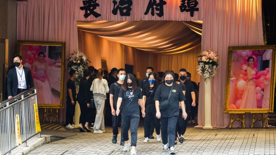 Mourners leave the memorial hall during the funeral of model Abby Choi in Hong Kong on June 18, 2023. (Photo: Joyce Zhou/Reuters)