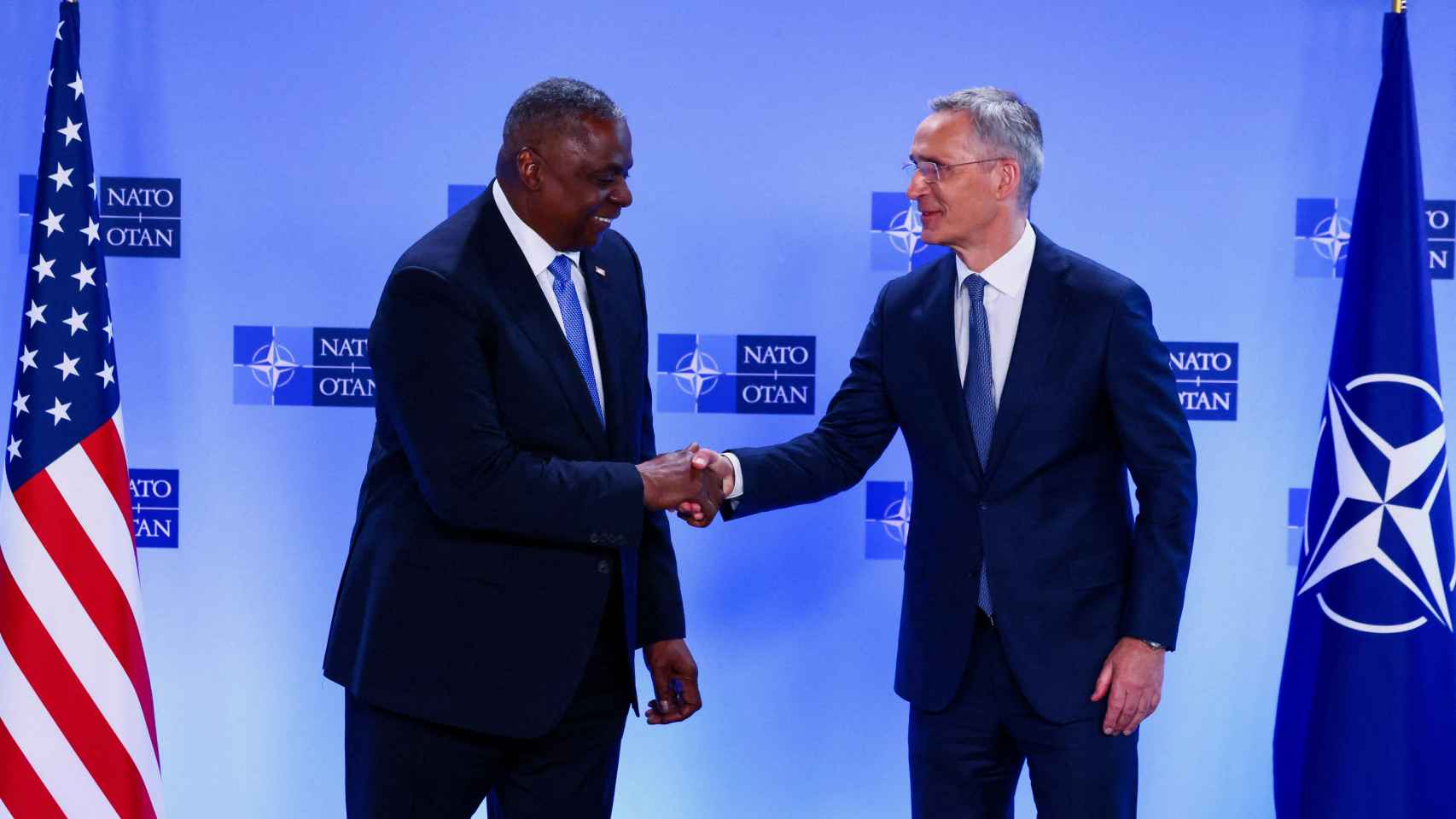 US Secretary of Defense Lloyd Austin and NATO Secretary General Jens Stoltenberg shake hands at a briefing on the day of the NATO Defense Ministers meeting at the Alliance headquarters in Brussels, Belgium,