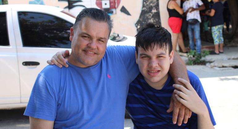 Cristian (left) and his son were some of the participants in the workshop to promote inclusive education.