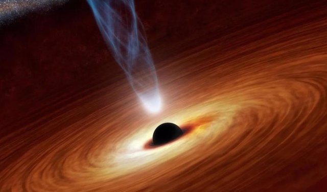 A supermassive black hole emits a stream of energetic particles in this illustration.