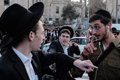 Ultra-Orthodox Jews storm a prison in Israel to free a young woman accused of skipping military service