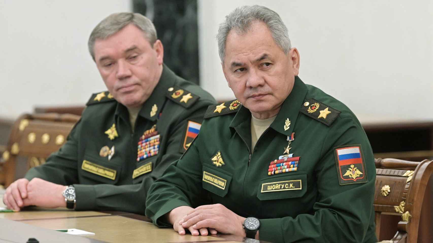 Russian Defense Minister Sergei Shoigu and Russian Armed Forces Chief of Staff Valery Gerasimov attend a meeting.