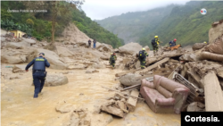 The intense rains caused the Naranjal river to rise, which overflowed, destroying several houses in the municipality of Quetame, Cundinamarca, in central Colombia.  Photo courtesy: Colombian Police.