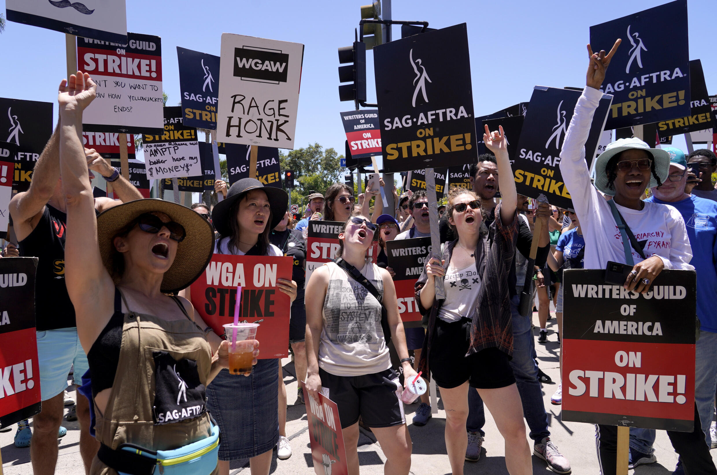 Striking screenwriters and actors demonstrate in front of Paramount Studios in Los Angeles on Friday, July 14, 2023.