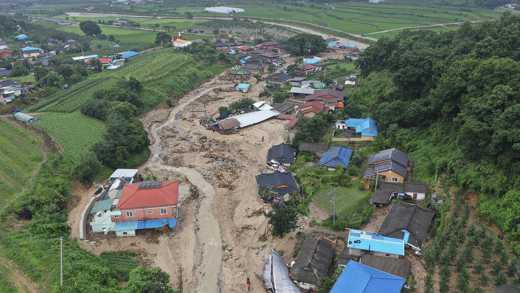 In South Korea, floods and torrential rains leave 33 dead