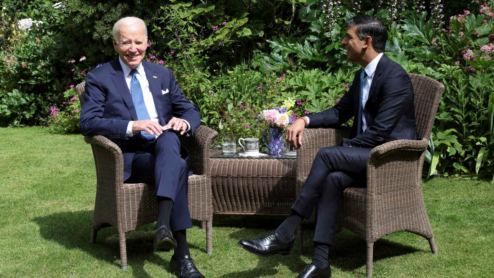 Biden with Sunak having tea.